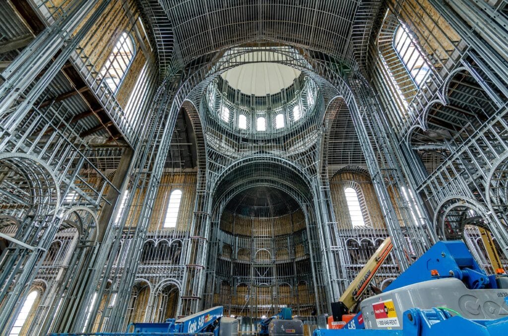 Stunning view of a partly constructed cathedral with intricate steel framing in Raleigh.